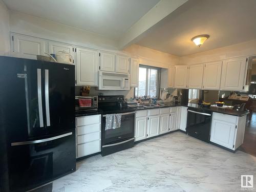 9624 75A St Nw, Edmonton, AB - Indoor Photo Showing Kitchen With Double Sink