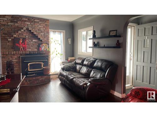 9624 75A St Nw, Edmonton, AB - Indoor Photo Showing Living Room With Fireplace