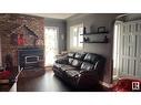 9624 75A St Nw, Edmonton, AB  - Indoor Photo Showing Living Room With Fireplace 