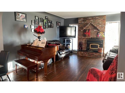 9624 75A St Nw, Edmonton, AB - Indoor Photo Showing Living Room With Fireplace