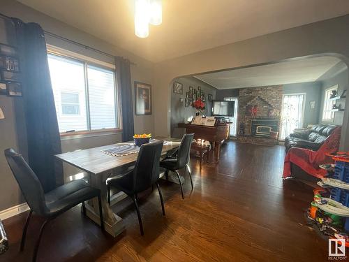 9624 75A St Nw, Edmonton, AB - Indoor Photo Showing Dining Room With Fireplace