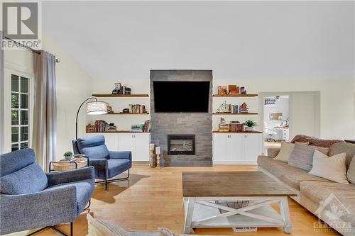 Main Level - 220 Garfield Street, Gananoque, ON - Indoor Photo Showing Living Room With Fireplace