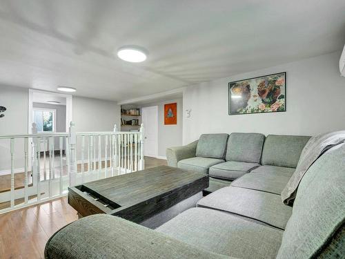 Family room - 109 Rue Du Sommet-Vert, Sainte-Marguerite-Du-Lac-Masson, QC - Indoor Photo Showing Living Room