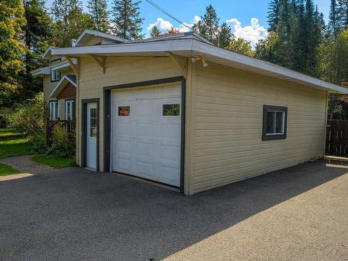 Garage - 109 Rue Du Sommet-Vert, Sainte-Marguerite-Du-Lac-Masson, QC - Outdoor With Exterior