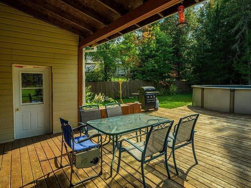 Patio - 109 Rue Du Sommet-Vert, Sainte-Marguerite-Du-Lac-Masson, QC - Outdoor With Above Ground Pool With Deck Patio Veranda With Exterior