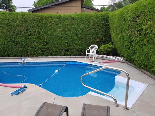 Cour - 1120 Rue Jean-De Brébeuf, Laval (Duvernay), QC - Outdoor With In Ground Pool With Backyard