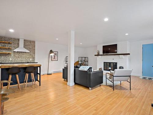 Salle familiale - 1470 Rue Labelle, Mont-Tremblant, QC - Indoor Photo Showing Living Room With Fireplace