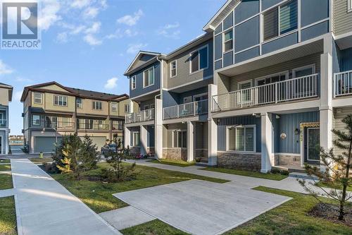 519 Corner Meadows Square Ne, Calgary, AB - Outdoor With Balcony With Facade