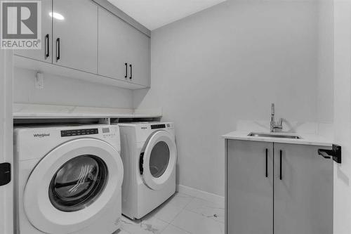 519 Corner Meadows Square Ne, Calgary, AB - Indoor Photo Showing Laundry Room