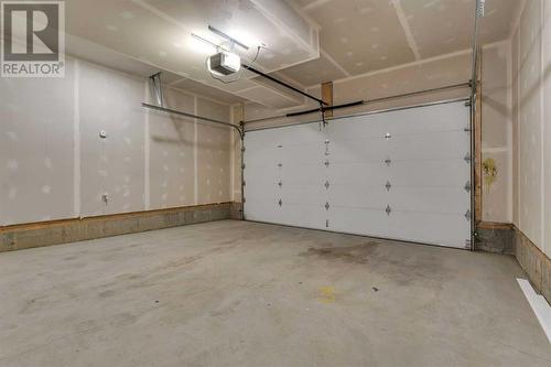 519 Corner Meadows Square Ne, Calgary, AB - Indoor Photo Showing Garage