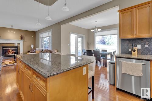 3017 Macneil Wy Nw, Edmonton, AB - Indoor Photo Showing Kitchen With Fireplace