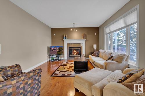 3017 Macneil Wy Nw, Edmonton, AB - Indoor Photo Showing Living Room With Fireplace