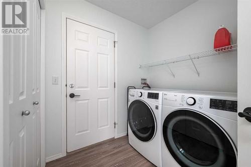 298 Arbour Crest Drive Nw, Calgary, AB - Indoor Photo Showing Laundry Room