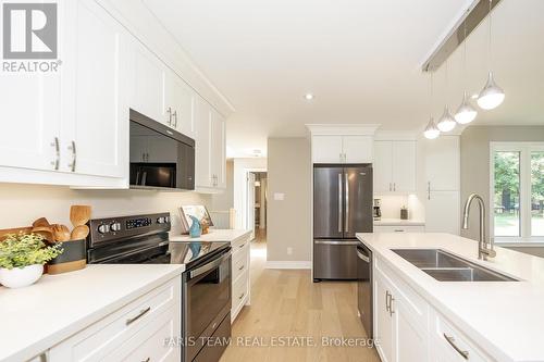 70 Copeland Creek Drive, Tiny, ON - Indoor Photo Showing Kitchen With Double Sink With Upgraded Kitchen