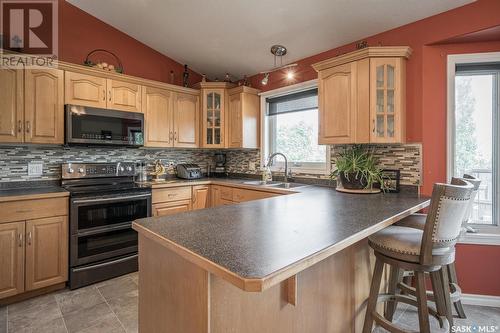 745 Grabowski Crescent, Warman, SK - Indoor Photo Showing Kitchen With Double Sink