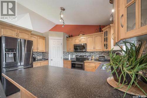 745 Grabowski Crescent, Warman, SK - Indoor Photo Showing Kitchen With Double Sink