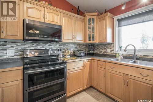 745 Grabowski Crescent, Warman, SK - Indoor Photo Showing Kitchen With Double Sink