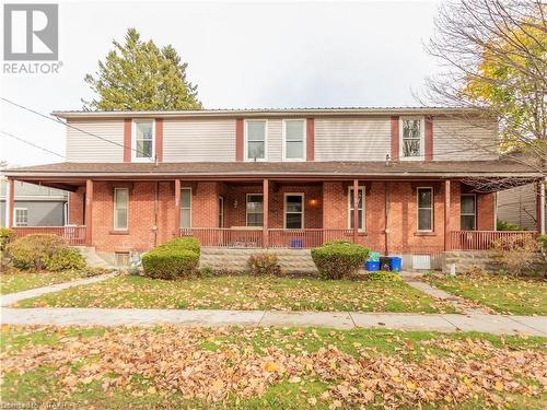 View of front of home with a porch - 60 Wellington St N/S Street N, Woodstock, ON - Outdoor With Deck Patio Veranda