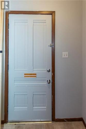 Doorway featuring tile patterned flooring - 60 Wellington St N/S Street N, Woodstock, ON - Indoor Photo Showing Other Room