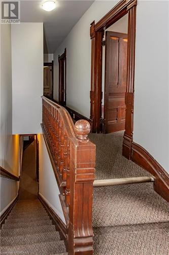 Stairs featuring carpet - 60 Wellington St N/S Street N, Woodstock, ON - Indoor Photo Showing Other Room