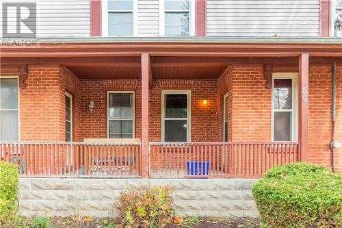 Doorway to property with a porch - 60 Wellington St N/S Street N, Woodstock, ON - Outdoor With Exterior