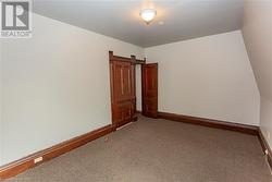 View of carpeted primary bedroom - 