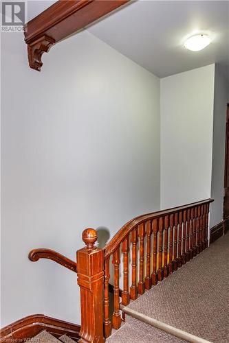 Staircase featuring carpet flooring - 60 Wellington St N/S Street N, Woodstock, ON - Indoor Photo Showing Other Room