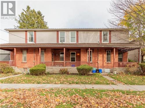 View of front of house with covered porch - 60 Wellington St N/S Street N, Woodstock, ON - Outdoor With Deck Patio Veranda