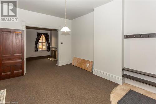 Unit 56 Unfurnished dining area with dark carpet - 60 Wellington St N/S Street N, Woodstock, ON - Indoor Photo Showing Other Room