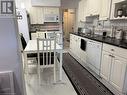 Kitchen with tasteful backsplash, sink, and white appliances - 1087 7Th Avenue W, Owen Sound, ON  - Indoor Photo Showing Kitchen 