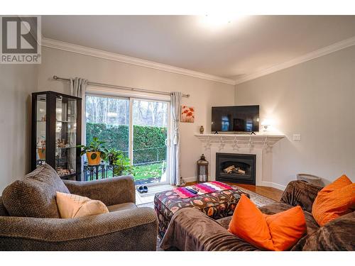 5101 19Th Street Unit# 11, Vernon, BC - Indoor Photo Showing Living Room With Fireplace