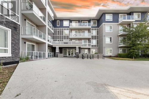 1404, 76 Cornerstone Passage Ne, Calgary, AB - Outdoor With Balcony With Facade