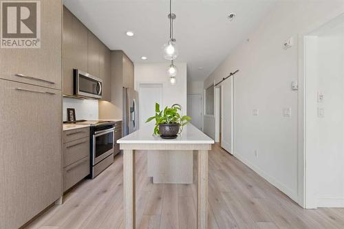 1404, 76 Cornerstone Passage Ne, Calgary, AB - Indoor Photo Showing Kitchen With Upgraded Kitchen