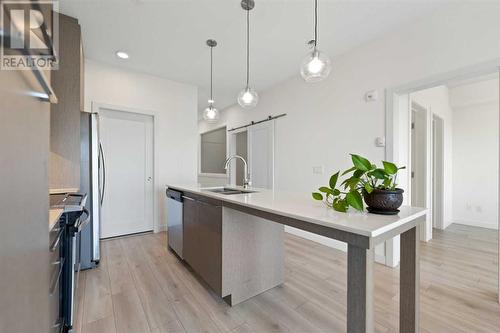 1404, 76 Cornerstone Passage Ne, Calgary, AB - Indoor Photo Showing Kitchen With Double Sink With Upgraded Kitchen