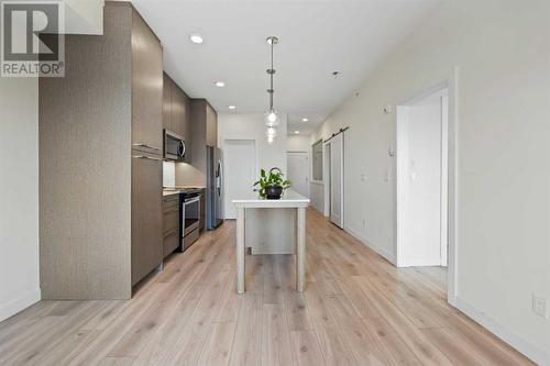 1404, 76 Cornerstone Passage Ne, Calgary, AB - Indoor Photo Showing Kitchen