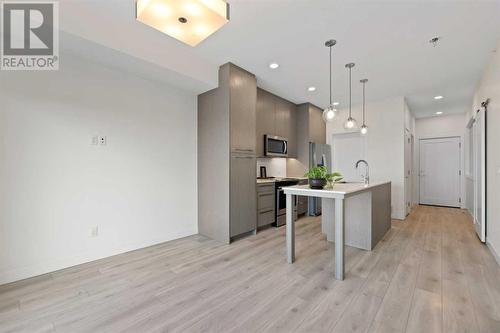 1404, 76 Cornerstone Passage Ne, Calgary, AB - Indoor Photo Showing Kitchen