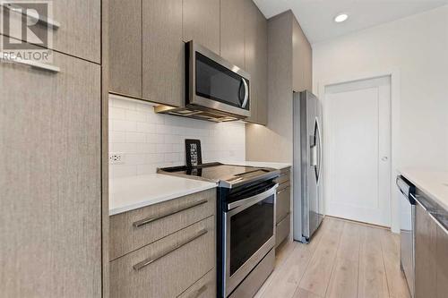 1404, 76 Cornerstone Passage Ne, Calgary, AB - Indoor Photo Showing Kitchen With Upgraded Kitchen