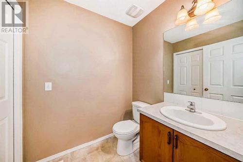 Half bath on main - 69 Saddlehorn Crescent Ne, Calgary, AB - Indoor Photo Showing Bathroom