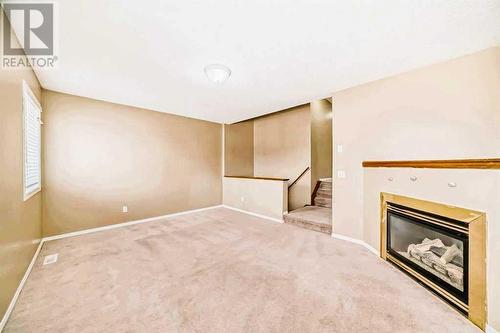 69 Saddlehorn Crescent Ne, Calgary, AB - Indoor With Fireplace