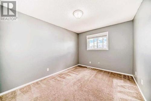 Bedroom 2 - 69 Saddlehorn Crescent Ne, Calgary, AB - Indoor Photo Showing Other Room