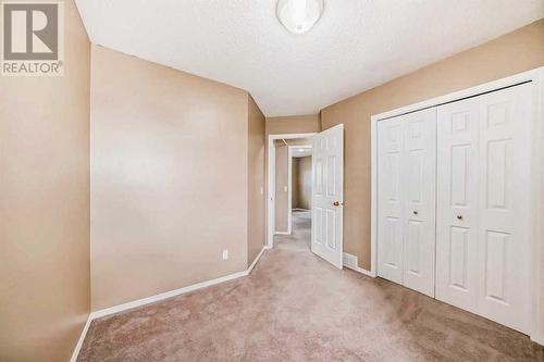 Bedroom 3 - 69 Saddlehorn Crescent Ne, Calgary, AB - Indoor Photo Showing Other Room