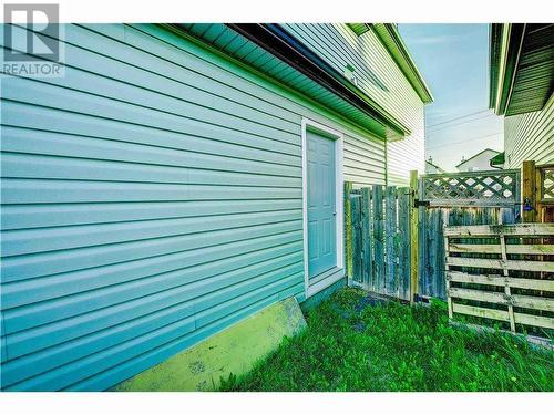 Side Entrance from Garage - 69 Saddlehorn Crescent Ne, Calgary, AB - Outdoor