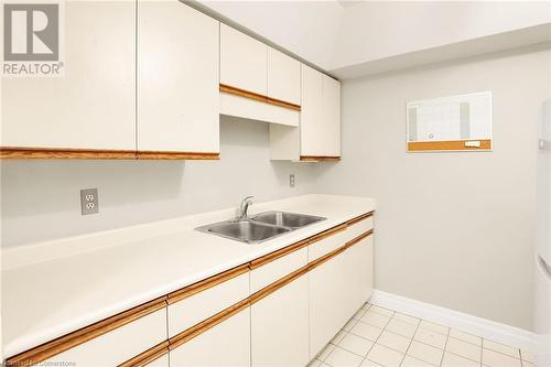 107 Bagot Street Unit# 108, Guelph, ON - Indoor Photo Showing Kitchen With Double Sink