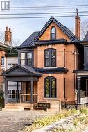 View of front of home with a porch - 