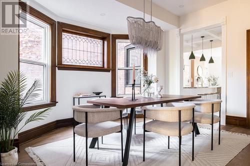 Dining area featuring light hardwood / wood-style floors - 109 East Avenue S, Hamilton, ON - Indoor Photo Showing Dining Room