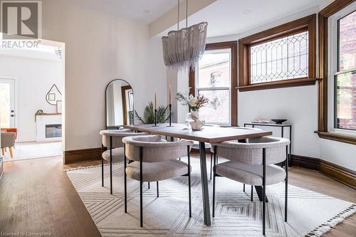 Dining space with plenty of natural light and light hardwood / wood-style floors - 109 East Avenue S, Hamilton, ON - Indoor Photo Showing Dining Room