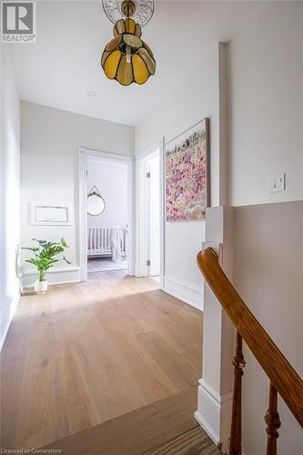 Hall with light wood-type flooring - 109 East Avenue S, Hamilton, ON - Indoor Photo Showing Other Room