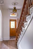 Foyer with light hardwood / wood-style floors - 