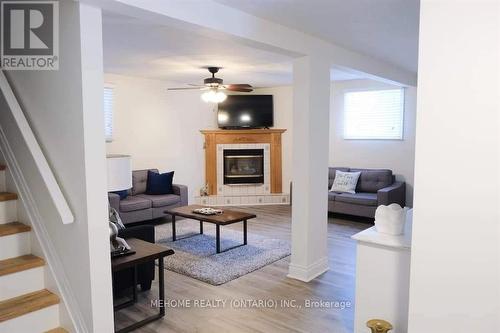 210 Desrocches Trail, Tiny, ON - Indoor Photo Showing Other Room With Fireplace