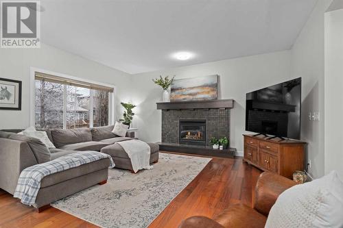 97 Mahogany Square Se, Calgary, AB - Indoor Photo Showing Living Room With Fireplace